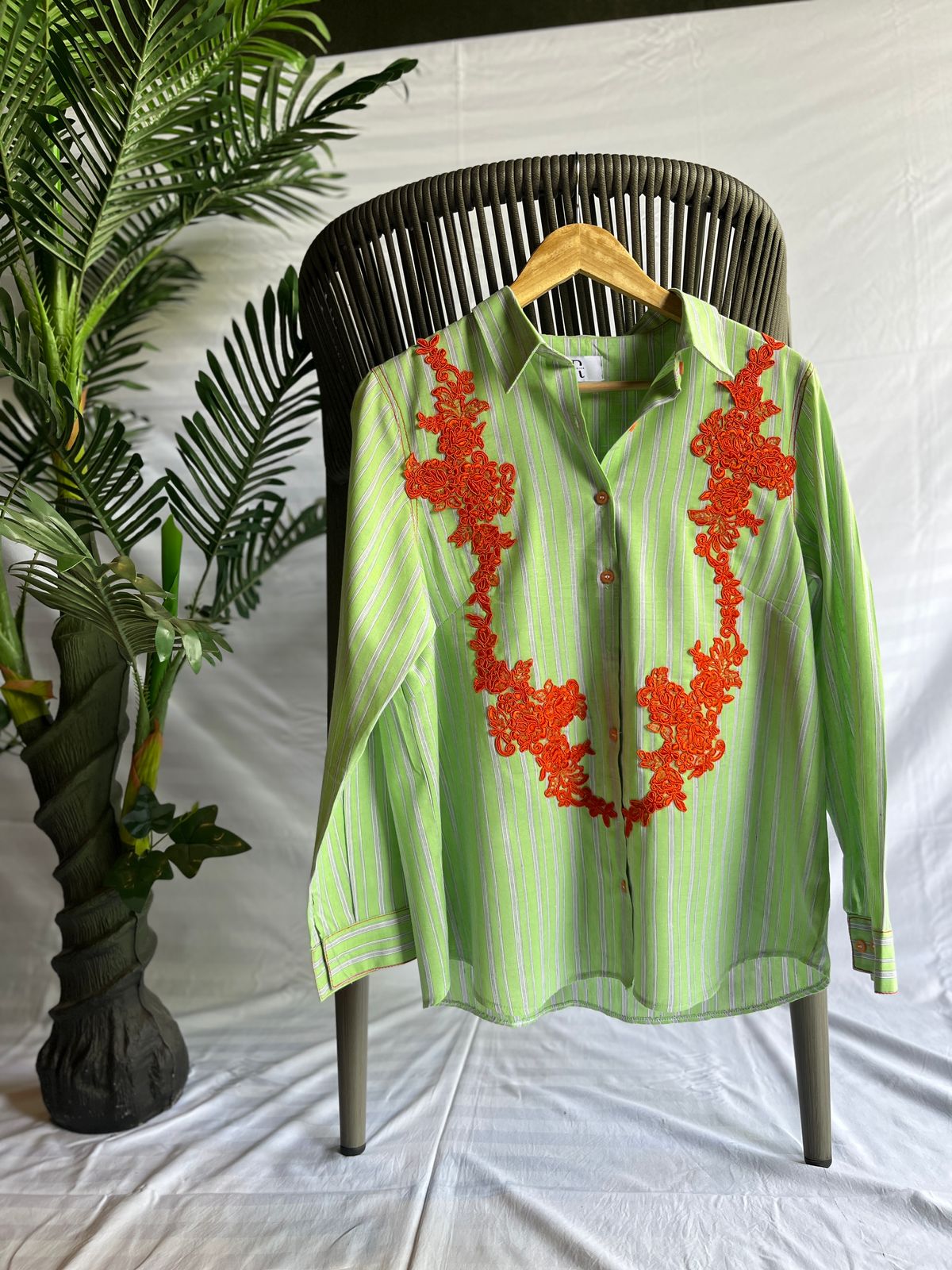 Green striped shirt with applique work